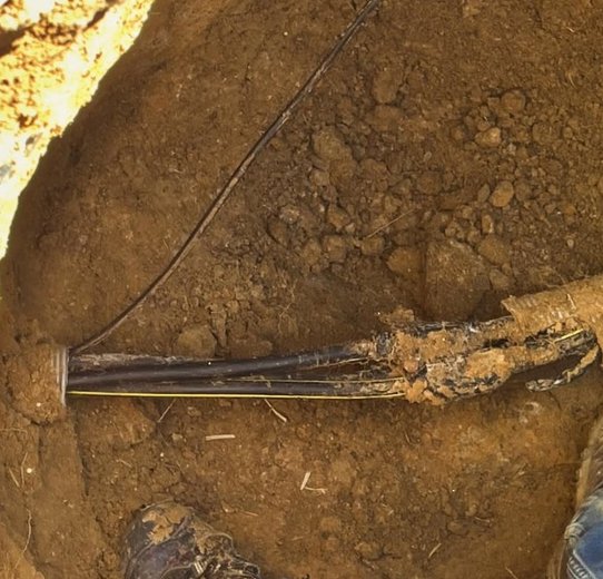 underground cable surrounded by dirt